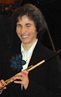 Kate Osborne, portrait photo with flute